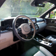 A photo of the driver seat and steering wheel in the Kia Sorento PHEV.